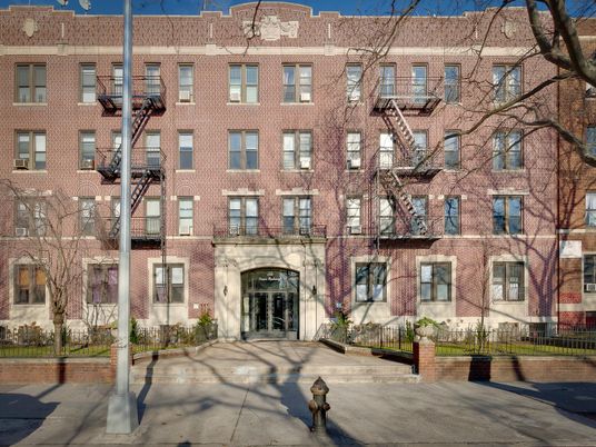 Exterior, Facade, Brick Facade, Condo Building