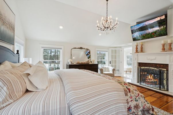 Bedroom, Chandelier, Fireplace, Interior, Recessed Lighting, Wood Texture Flooring