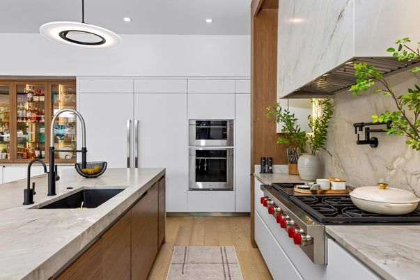Interior, Kitchen, Marble Walls, Pendant Lights, Recessed Lighting, Stainless Steel Appliances, Wood Texture Flooring