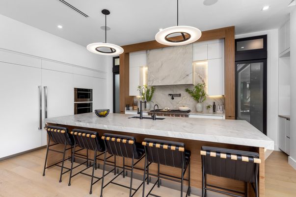 Interior, Kitchen, Marble Walls, Pendant Lights, Recessed Lighting, Stainless Steel Appliances, Wood Texture Flooring