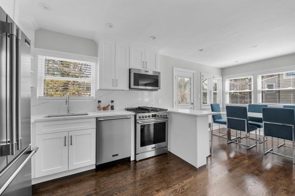 Dining room, Interior, Kitchen, Recessed Lighting, Stainless Steel Appliances, Wood Texture Flooring