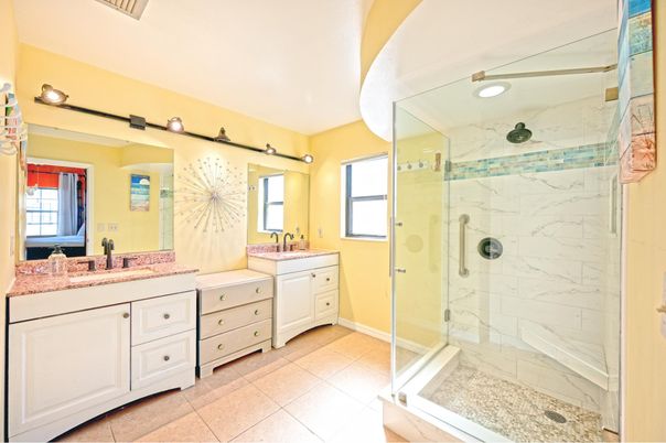 Bathroom, Dual Sink Vanities, Glass Shower, Interior, Marble Walls, Recessed Lighting