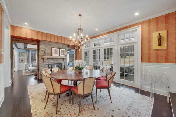 Chandelier, Dining room, Fireplace, Interior, Recessed Lighting, Stone Walls, Wood Texture Flooring