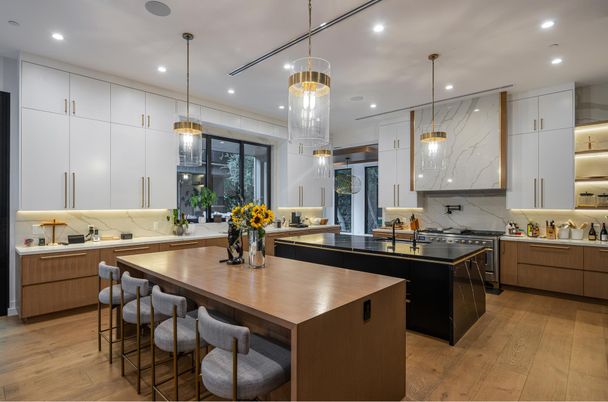 Interior, Kitchen, Marble Walls, Pendant Lights, Recessed Lighting, Stainless Steel Appliances, Wood Texture Flooring