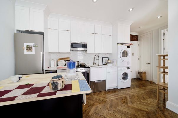 Interior, Kitchen, Recessed Lighting, Washer, Wood Texture Flooring