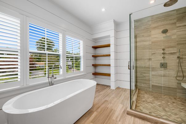 Bathroom, Free Standing Baths, Glass Shower, Interior, Recessed Lighting, Wood Texture Flooring