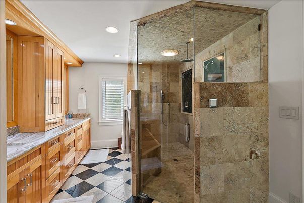 Bathroom, Dual Sink Vanities, Glass Shower, Interior, Recessed Lighting, Stone Walls