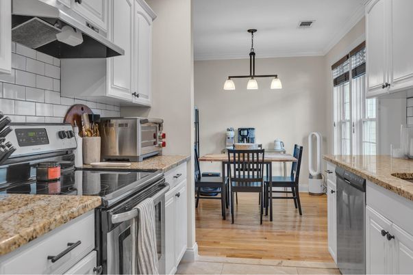 Dining room, Interior, Kitchen, Pendant Lights, Stainless Steel Appliances, Wood Texture Flooring