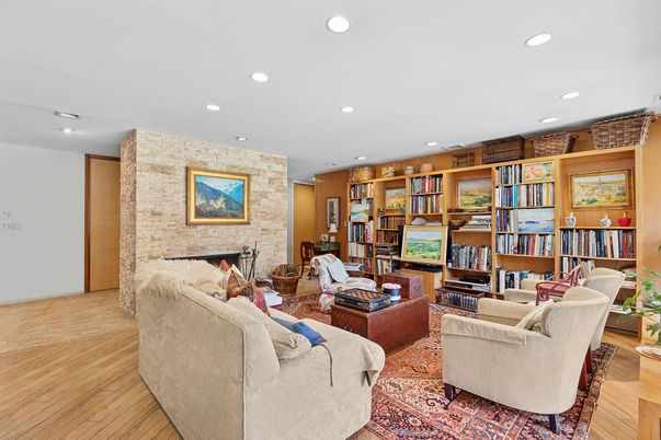 Fireplace, Interior, Living room, Recessed Lighting, Stone Walls, Wood Texture Flooring