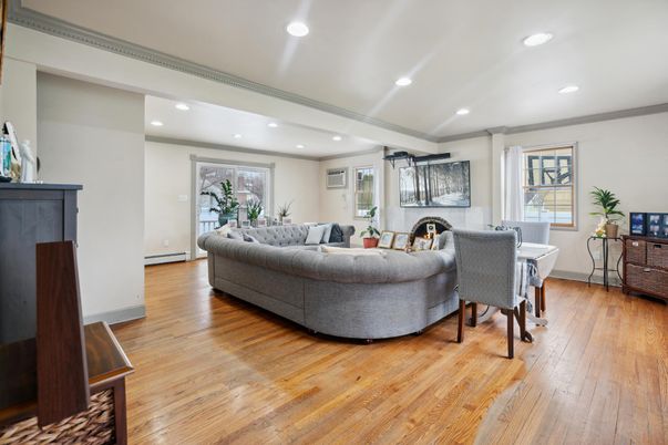 Dining room, Fireplace, Interior, Living room, Recessed Lighting, Wood Texture Flooring