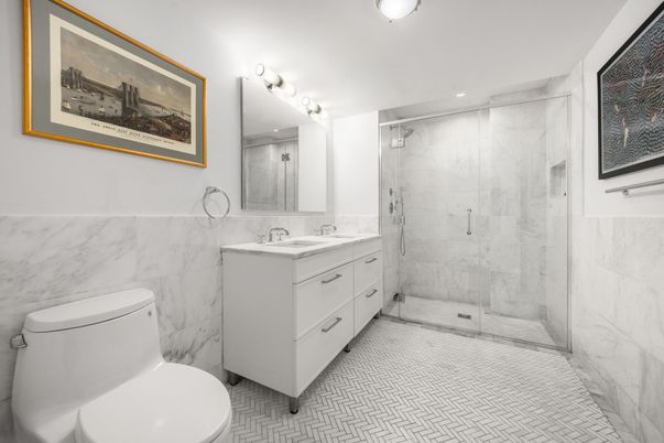 Bathroom, Dual Sink Vanities, Glass Shower, Interior, Marble Walls, Recessed Lighting