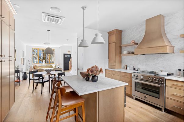 Dining room, Interior, Kitchen, Marble Walls, Pendant Lights, Stainless Steel Appliances, Wood Texture Flooring
