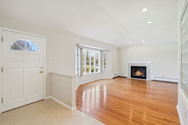 Empty room, Fireplace, Interior, Recessed Lighting, Wood Texture Flooring