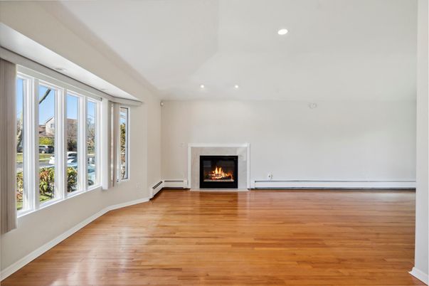 Empty room, Fireplace, Interior, Recessed Lighting, Wood Texture Flooring