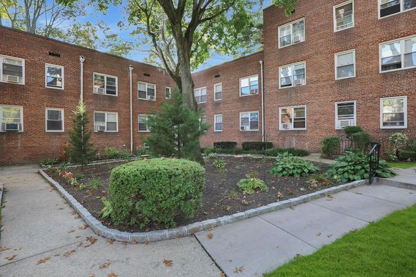 Exterior, Facade, Brick Facade, Condo Building