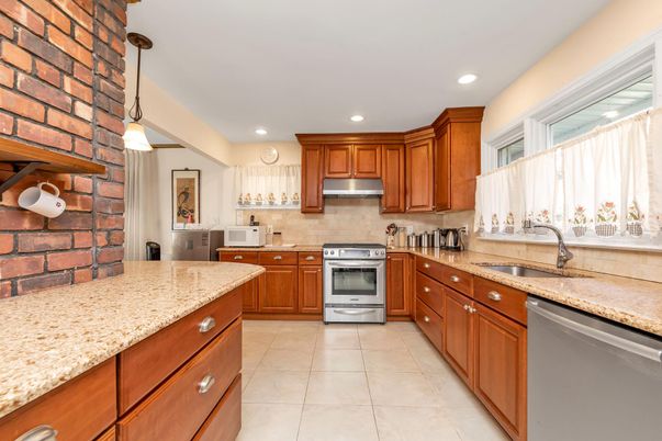 Interior, Kitchen, Pendant Lights, Recessed Lighting, Stainless Steel Appliances, Stone Walls