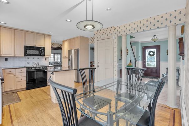 Dining room, Interior, Kitchen, Pendant Lights, Recessed Lighting, Stainless Steel Appliances, Wood Texture Flooring