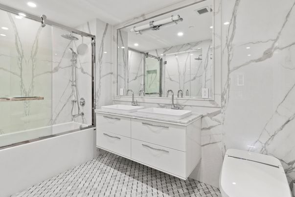 Bathroom, Dual Sink Vanities, Glass Shower, Interior, Marble Walls, Recessed Lighting