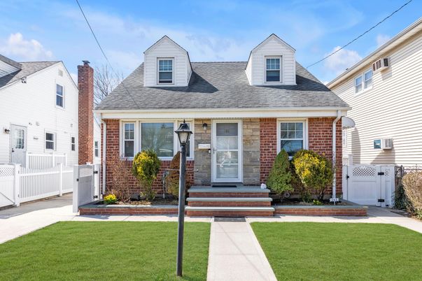Exterior, Facade, Brick Facade, Cape Cod