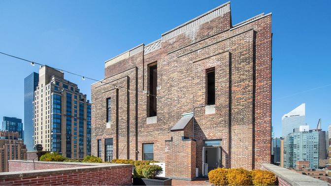 Exterior, Facade, Brick Facade, Condo Building
