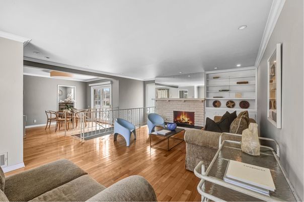 Dining room, Fireplace, Interior, Living room, Recessed Lighting, Wood Texture Flooring