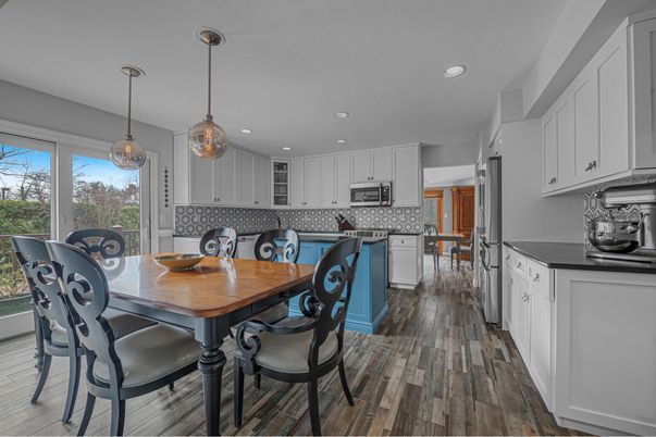 Dining room, Interior, Kitchen, Pendant Lights, Recessed Lighting, Stainless Steel Appliances, Wood Texture Flooring