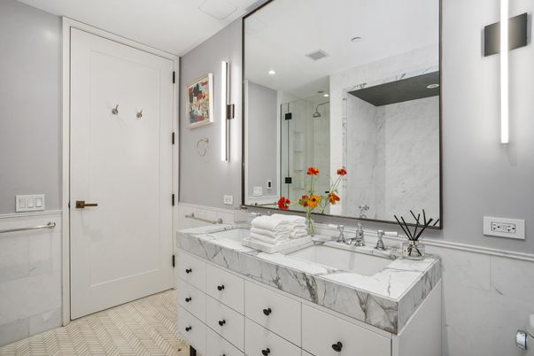 Bathroom, Dual Sink Vanities, Glass Shower, Interior, Marble Walls, Recessed Lighting