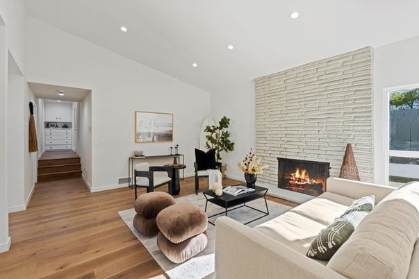 Fireplace, Interior, Living room, Piano, Recessed Lighting, Stone Walls, Wood Texture Flooring