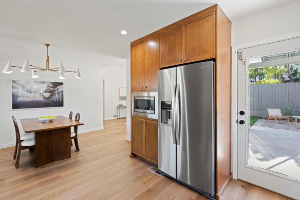 Dining room, Interior, Kitchen, Pendant Lights, Recessed Lighting, Stainless Steel Appliances, Wood Texture Flooring