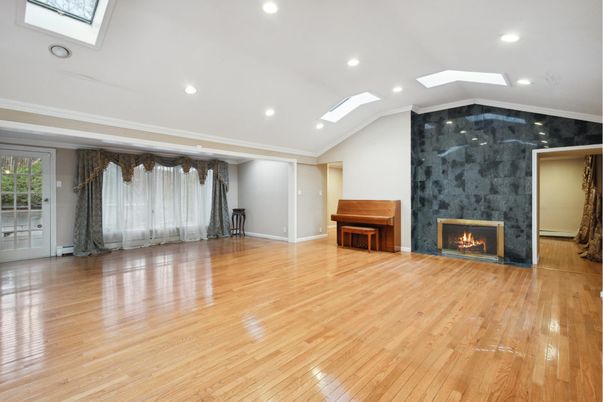 Empty room, Fireplace, Interior, Piano, Recessed Lighting, Wood Texture Flooring