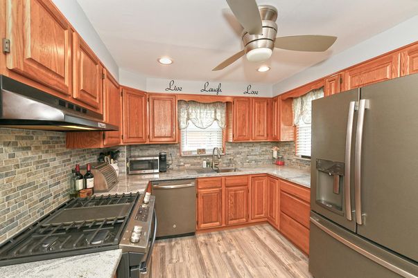 Interior, Kitchen, Recessed Lighting, Stainless Steel Appliances, Stone Walls, Wood Texture Flooring