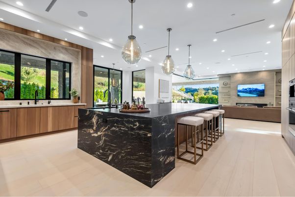 Interior, Kitchen, Marble Walls, Pendant Lights, Recessed Lighting, Stainless Steel Appliances, Wood Texture Flooring