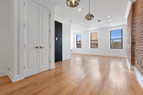 Empty room, Interior, Pendant Lights, Recessed Lighting, Stone Walls, Wood Texture Flooring