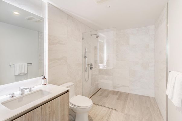 Bathroom, Glass Shower, Interior, Marble Walls, Recessed Lighting, Wood Texture Flooring