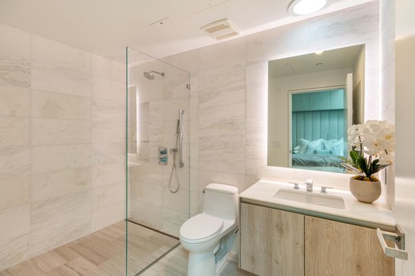 Bathroom, Glass Shower, Interior, Marble Walls, Recessed Lighting, Wood Texture Flooring