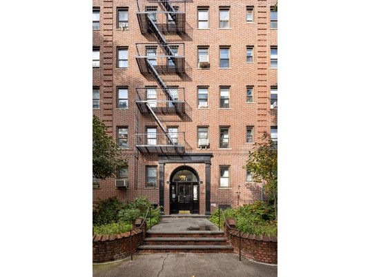 Exterior, Facade, Brick Facade, Condo Building