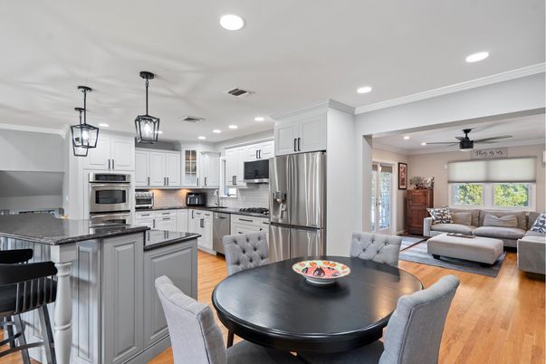 Dining room, Interior, Kitchen, Living room, Pendant Lights, Recessed Lighting, Stainless Steel Appliances, Wood Texture Flooring