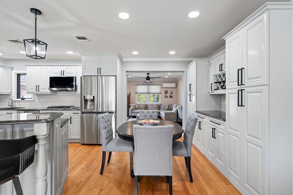 Dining room, Interior, Kitchen, Pendant Lights, Recessed Lighting, Stainless Steel Appliances, Wood Texture Flooring