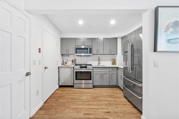 Interior, Kitchen, Recessed Lighting, Stainless Steel Appliances, Wood Texture Flooring