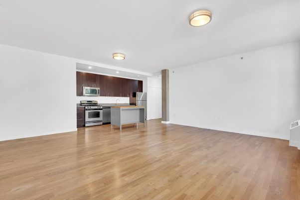 Empty room, Interior, Kitchen, Stainless Steel Appliances, Wood Texture Flooring