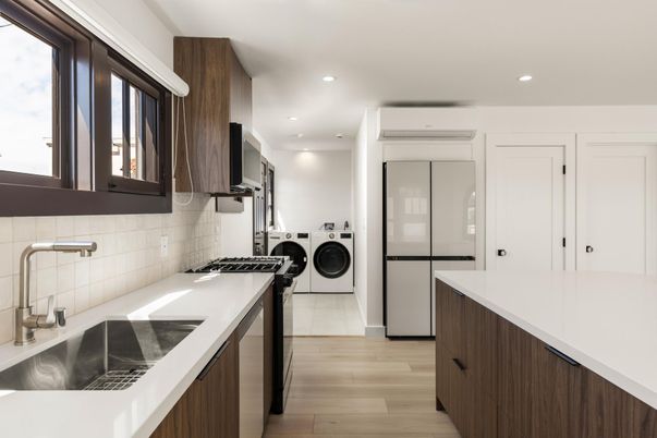 Interior, Kitchen, Recessed Lighting, Washer, Wood Texture Flooring