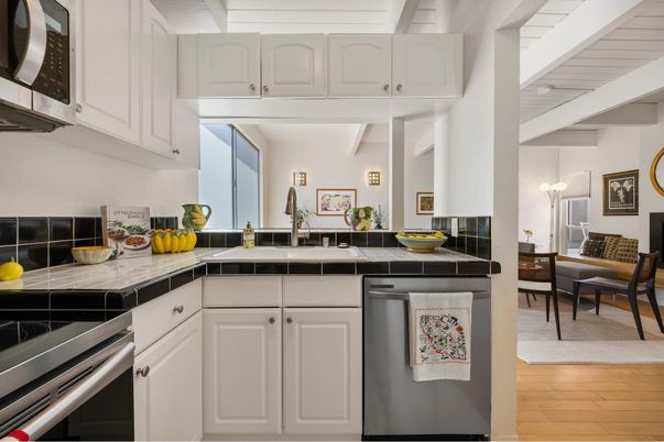 Interior, Kitchen, Stainless Steel Appliances, Tile Countertops, Wood Texture Flooring