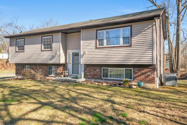 Exterior, Facade, Brick Facade, Raised Ranch