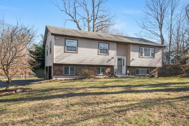 Exterior, Facade, Brick Facade, Raised Ranch
