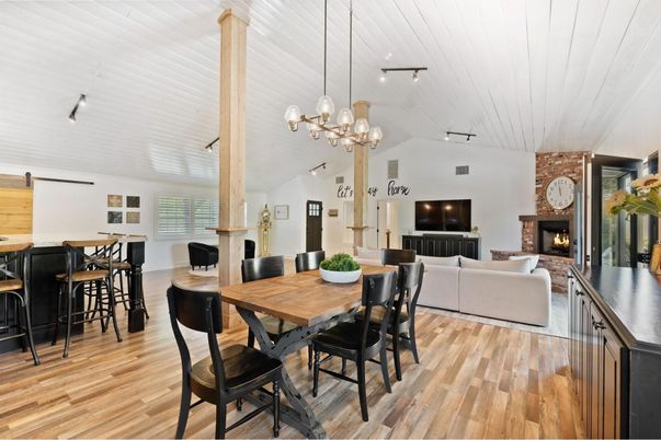 Dining room, Fireplace, Interior, Living room, Pendant Lights, Stone Walls, Wood Texture Flooring