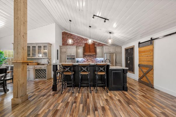 Interior, Kitchen, Pendant Lights, Stainless Steel Appliances, Stone Walls, Wood Texture Flooring