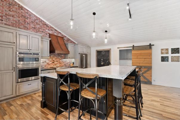 Interior, Kitchen, Pendant Lights, Stainless Steel Appliances, Stone Walls, Wood Texture Flooring