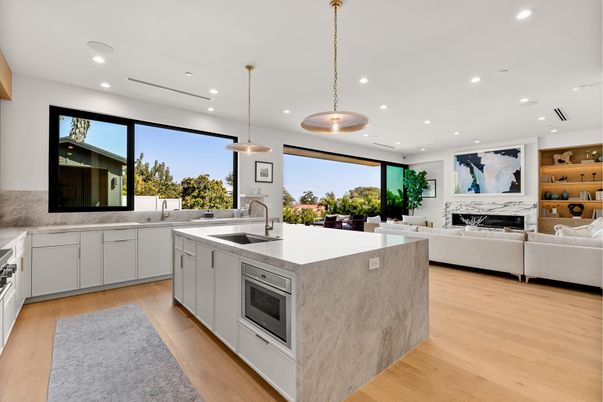 Fireplace, Interior, Kitchen, Living room, Pendant Lights, Recessed Lighting, Stainless Steel Appliances, Wood Texture Flooring