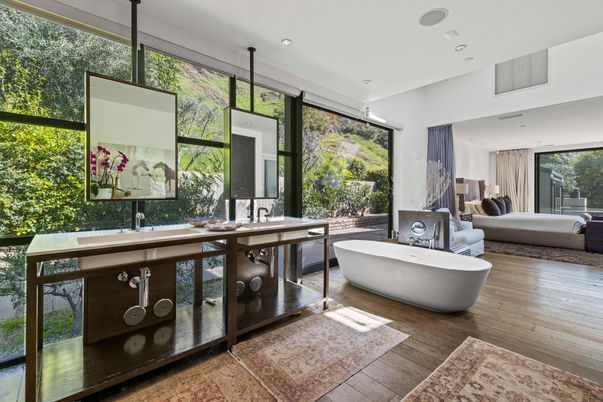 Bathroom, Dual Sink Vanities, Free Standing Baths, Interior, Pendant Lights, Recessed Lighting, Wood Texture Flooring