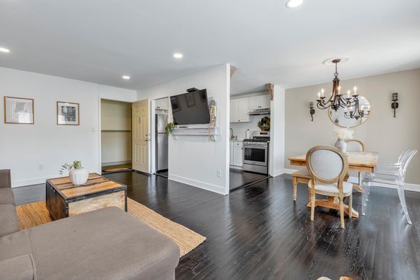 Chandelier, Dining room, Interior, Kitchen, Recessed Lighting, Stainless Steel Appliances, Wood Texture Flooring